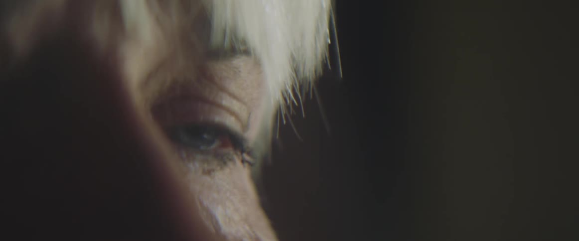 Close up of a sad elderly woman with wrinkles