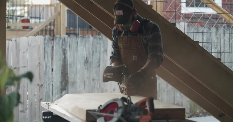 A man doing woodowork