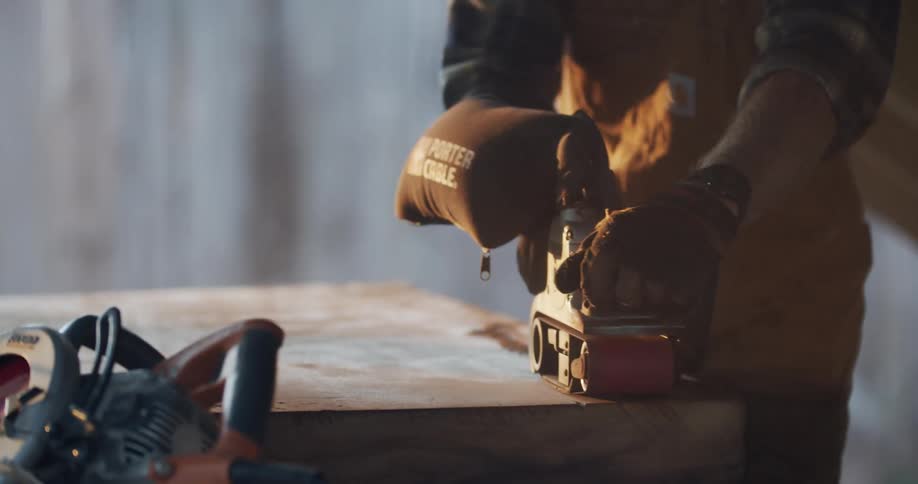 A man working on a piece of wood