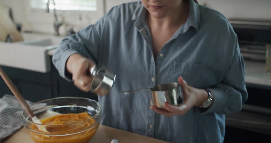 A woman baking at home
