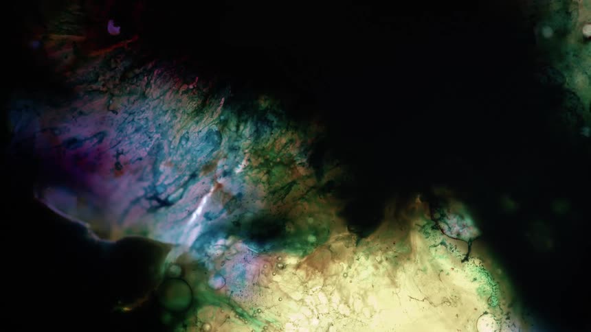 A close up of mixing liquids