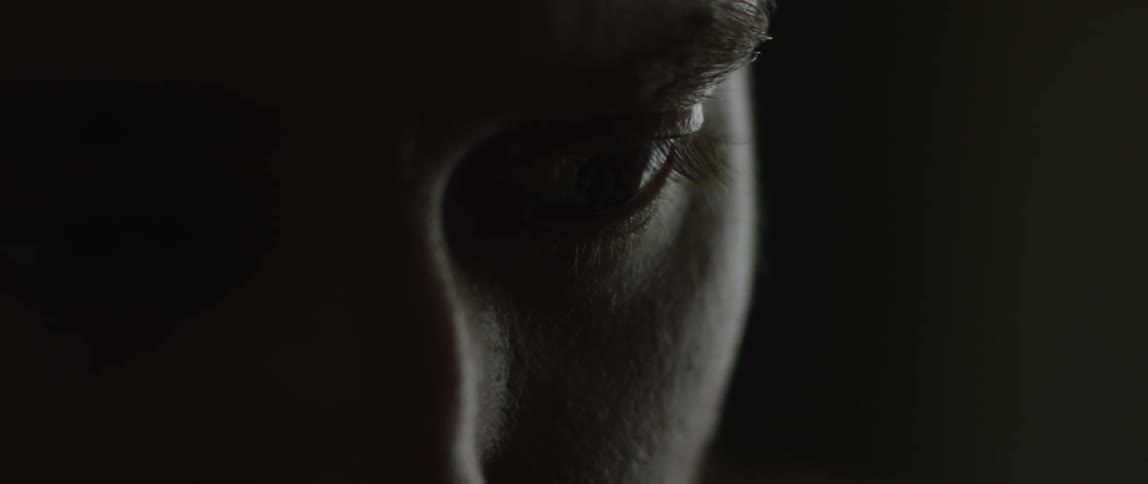 Man gazes into darkness