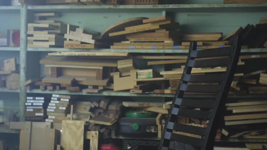 The shop is full of wood on the shelves