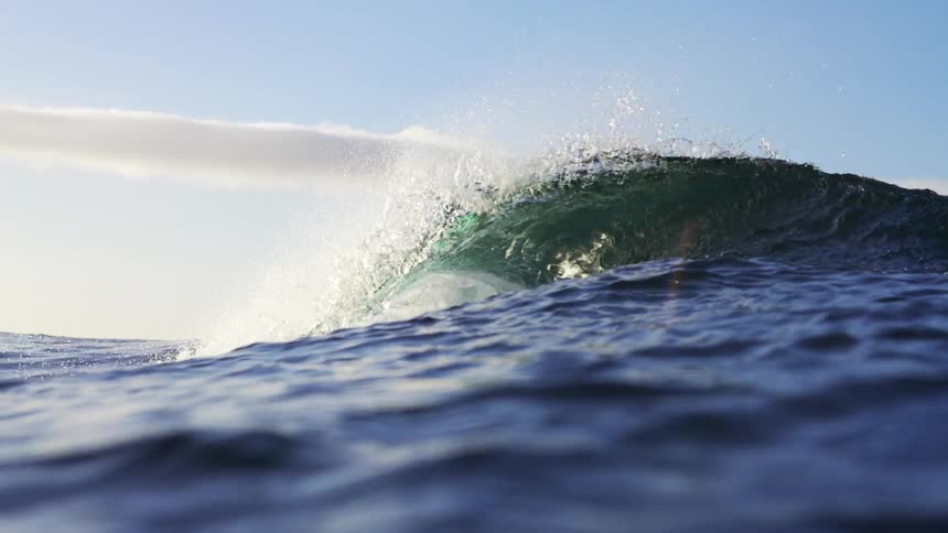A wave crashing with the ocean