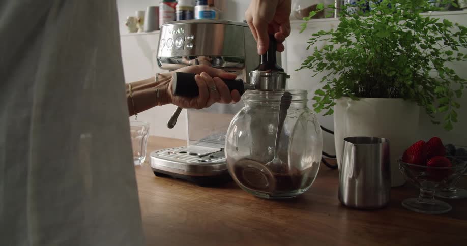 Human grinding coffee