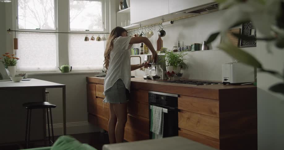 Woman making coffee