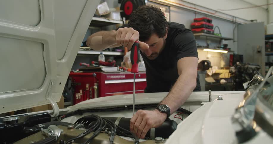 A man working on a car