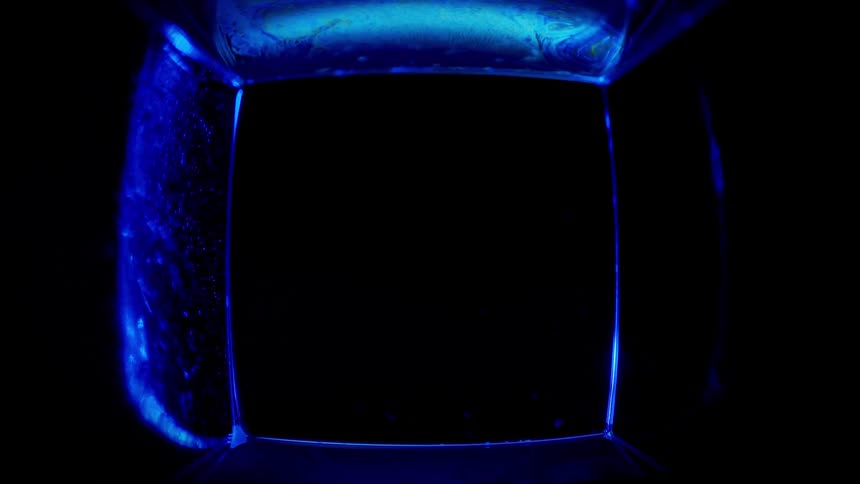 Abstract footage of neon lights in liquid