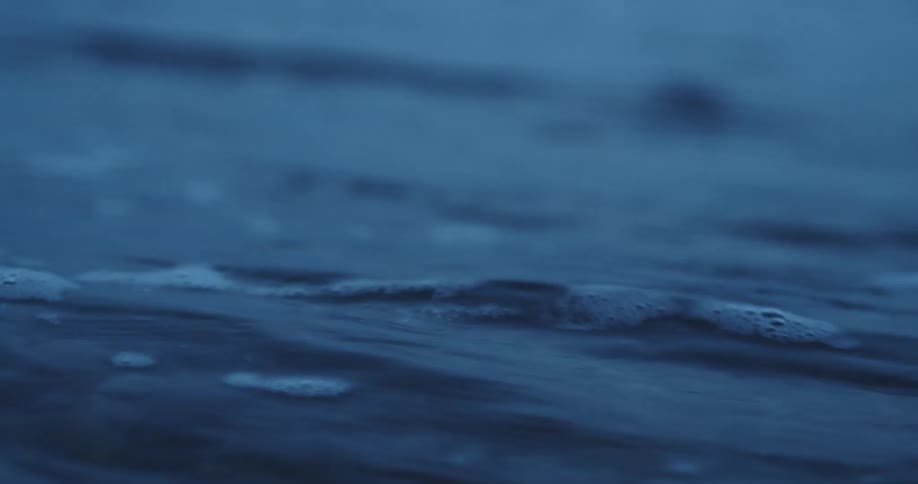 Close up of ocean waves crashing during the daytime