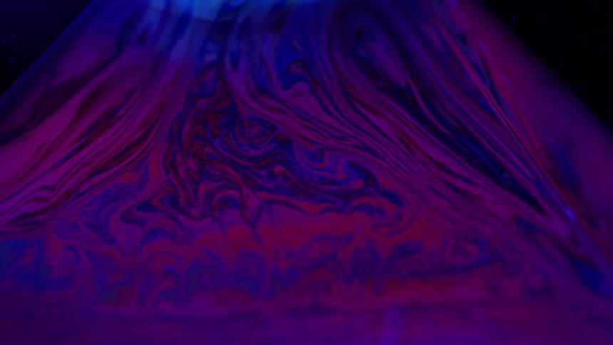 A close up of liquids mixing