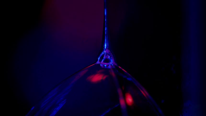 A close up of a liquid falling