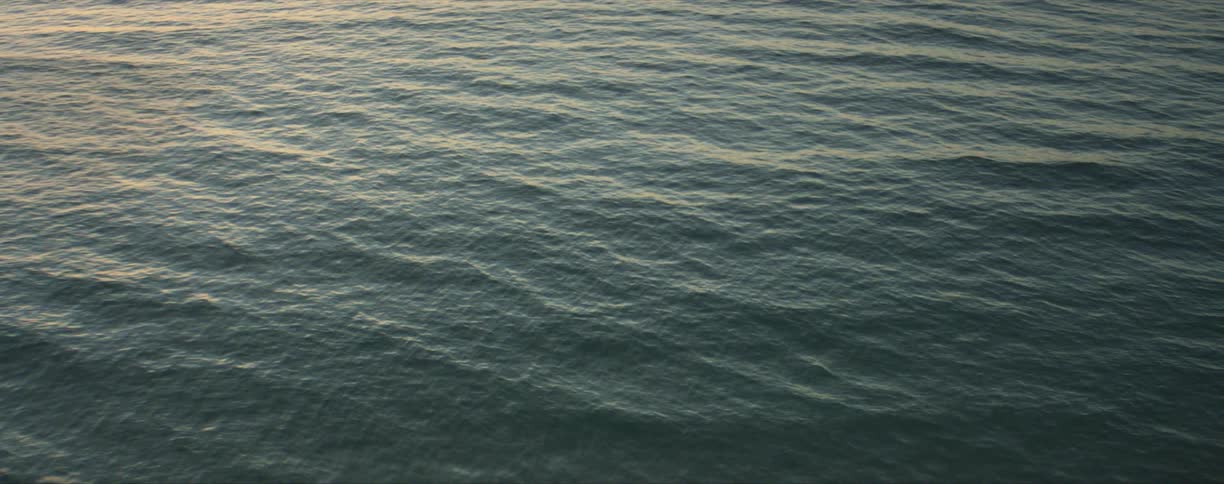 Ocean water gently rolling in