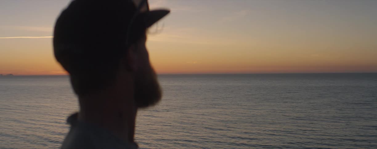A man looking out into the ocean