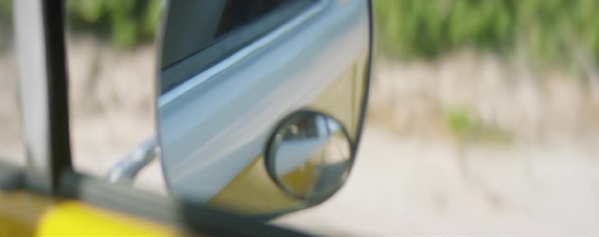 A close up of a car side mirror