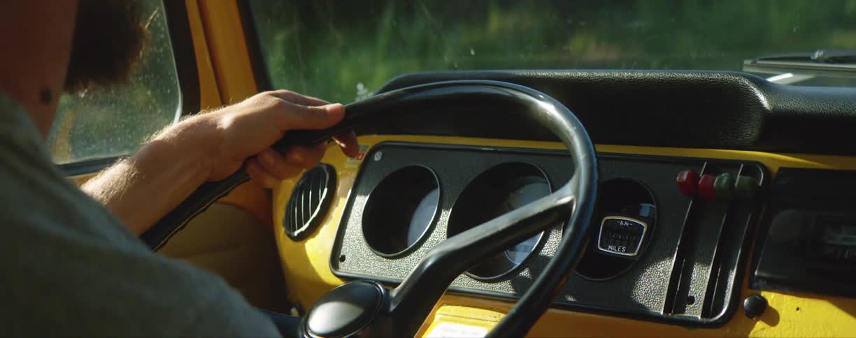 A man driving in a truck