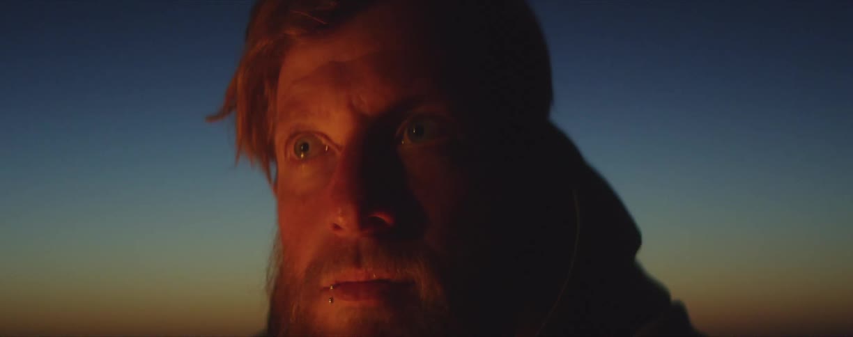 The light flashes on the mans face