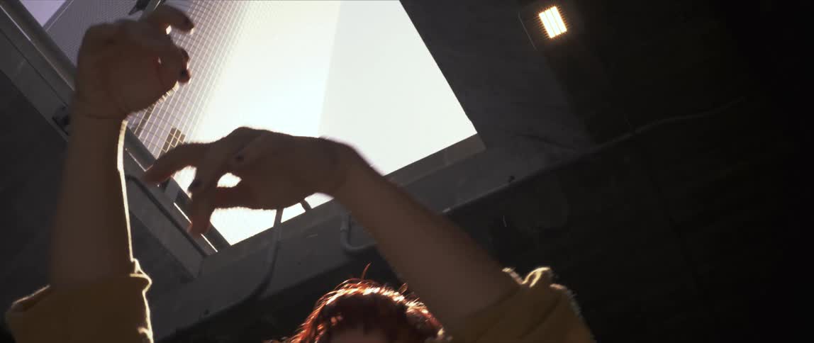 A person dancing during sunset