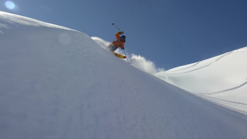 A person skiing down a mountain