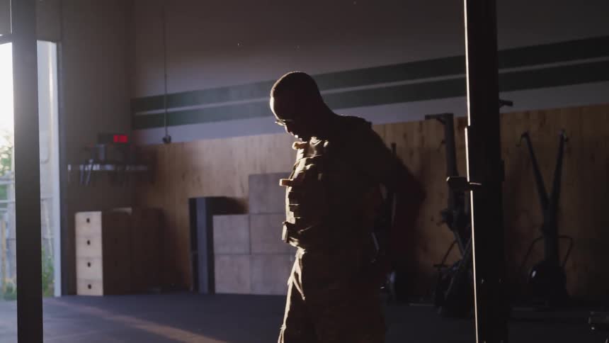 A young man catches his breath after exercising