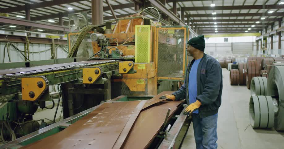 A man working on heavy machinery