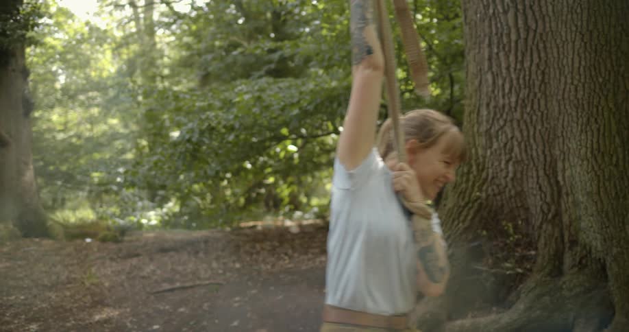 A woman playing on a rope string