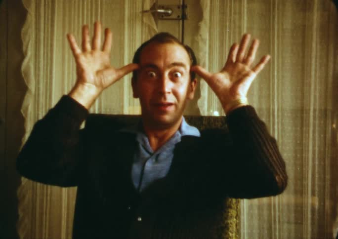 A man making funny faces to the camera