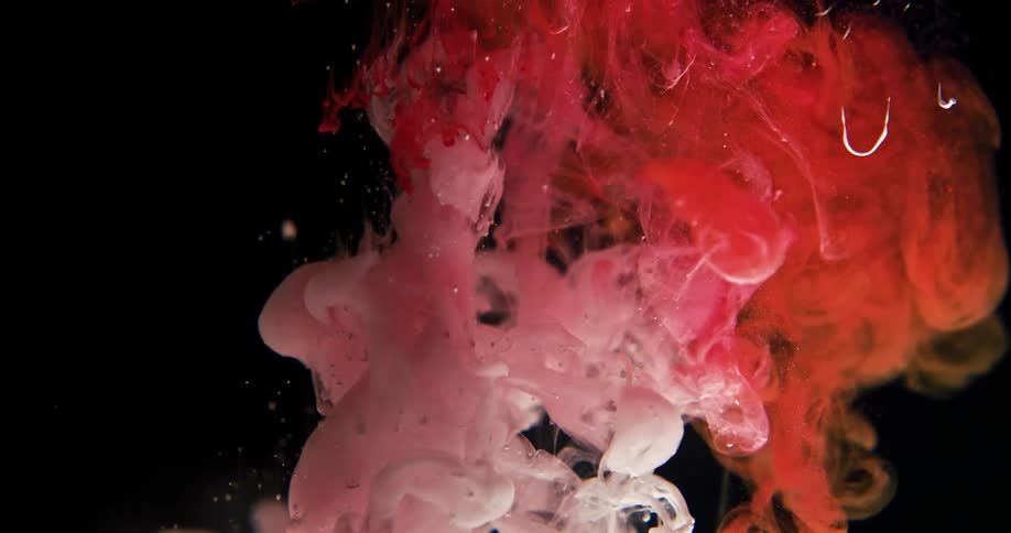 Black red and pink colors that look like paint and water