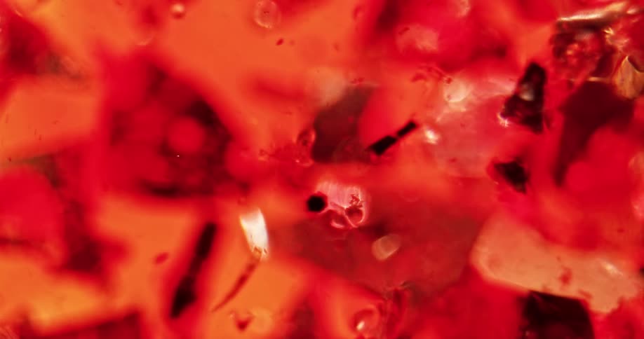 A close up of crystals in a liquid