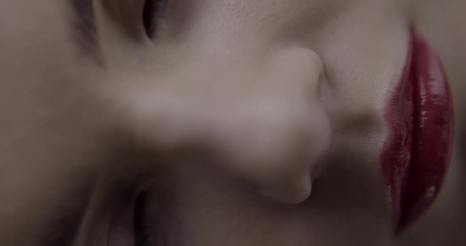 A close up of a womans face