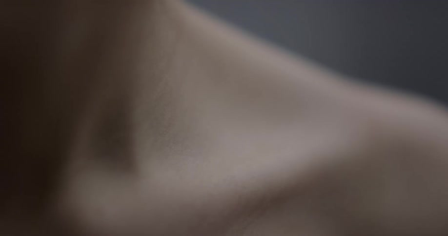 A persons shoulder in a room