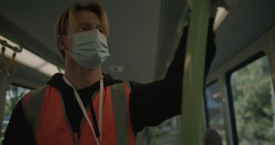 Working man disinfecting and cleaning up the train