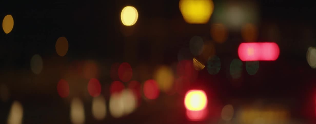 The flare of city lights at night