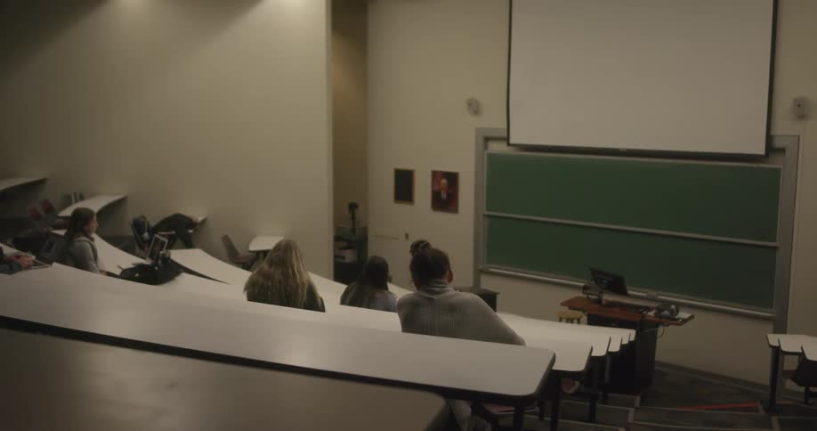 Students sit in classroom waiting for lecturer