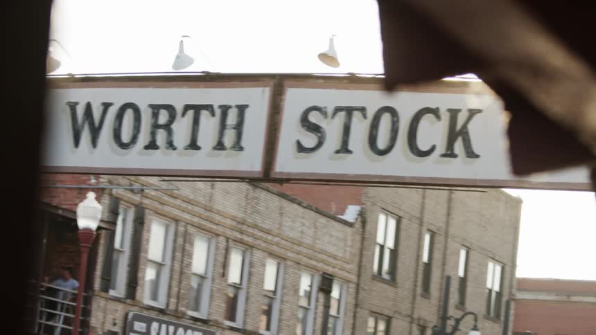 People sitting at tables at the fort worth stock yard