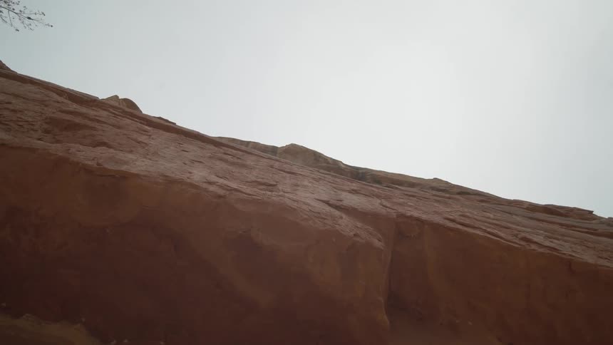 Orbiting shot of a canyon cliff