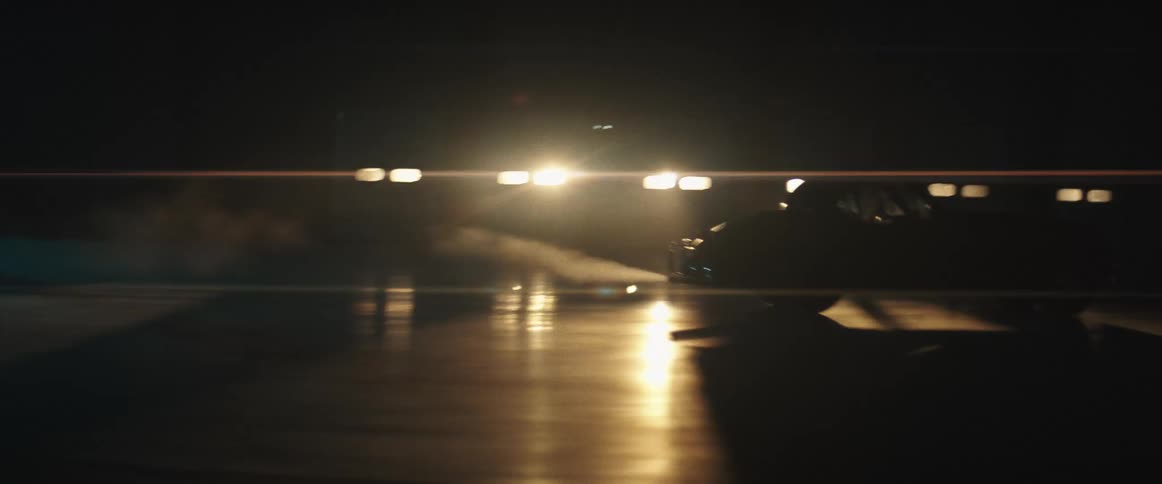 A car driving away from the camera