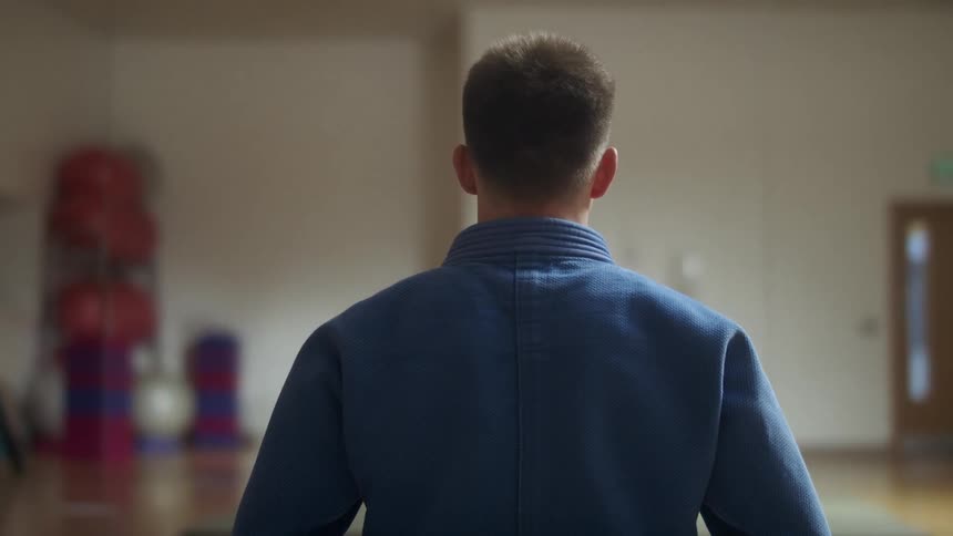 A man standing in a gym