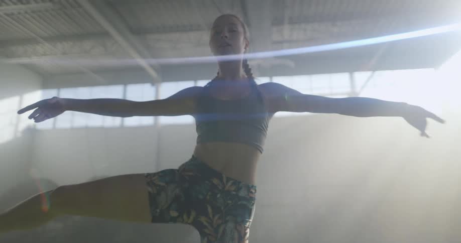 A woman exercising indoors