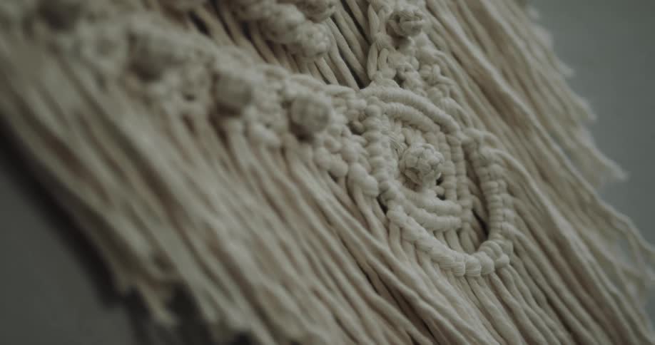 Close up of a braided decoration made of white string