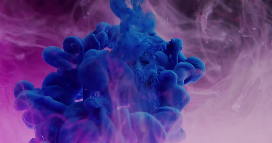 Blue dye sprays down and covers a flower floating in a pink cloud