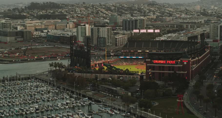 Aerial view of a city next to the ocean is displayed