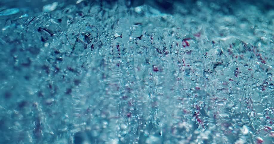 Water dripping down ice crystals
