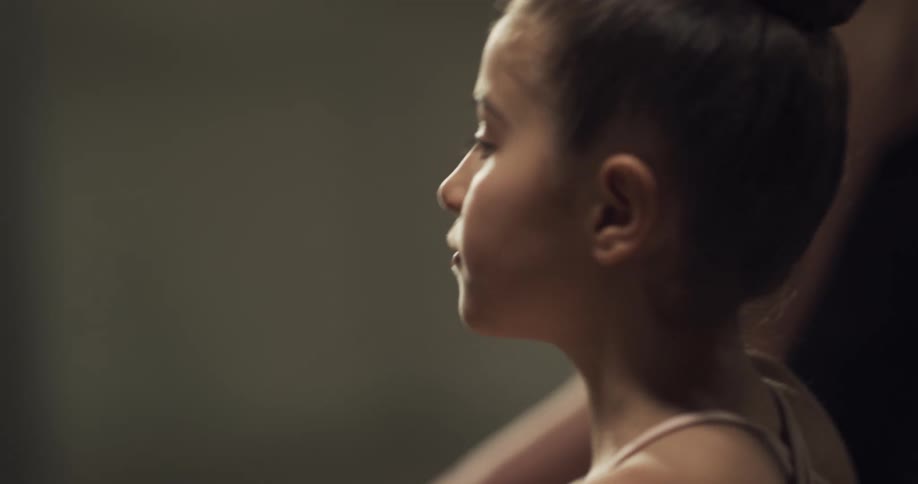 A child is practicing ballet