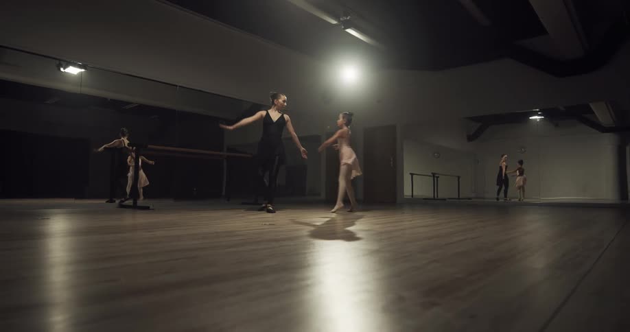 Two women practicing ballet