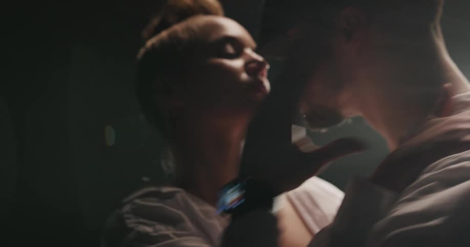 A man and woman dancing in a studio