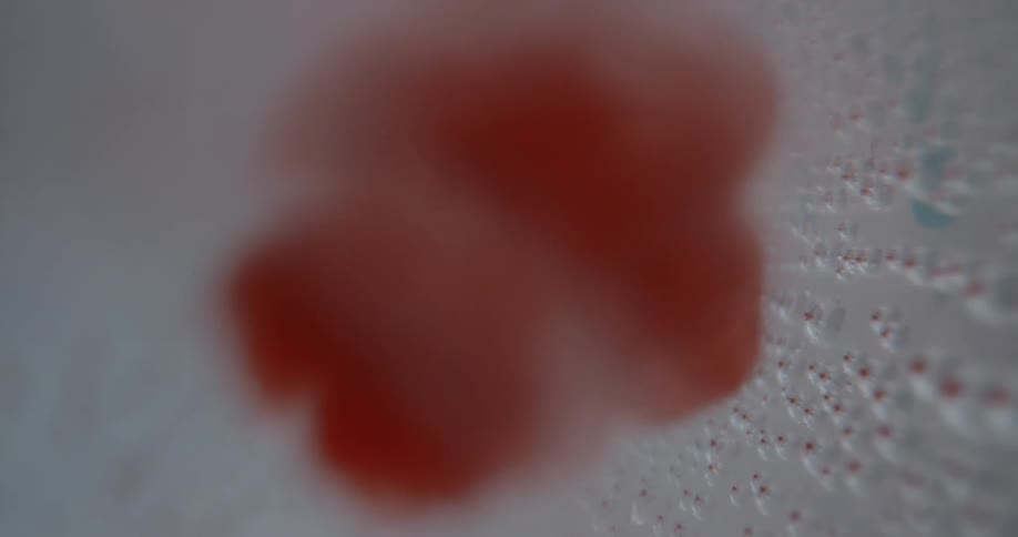 The bubbles rise with the red color