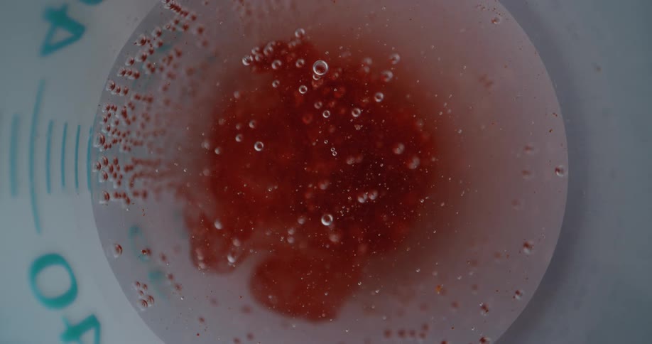 Inside a syringe during aspiration before injection