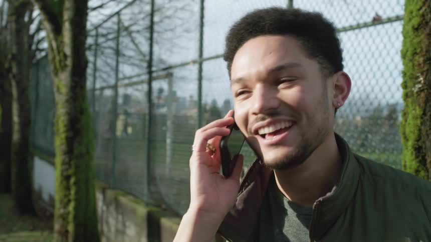 A man talking on a smart phone