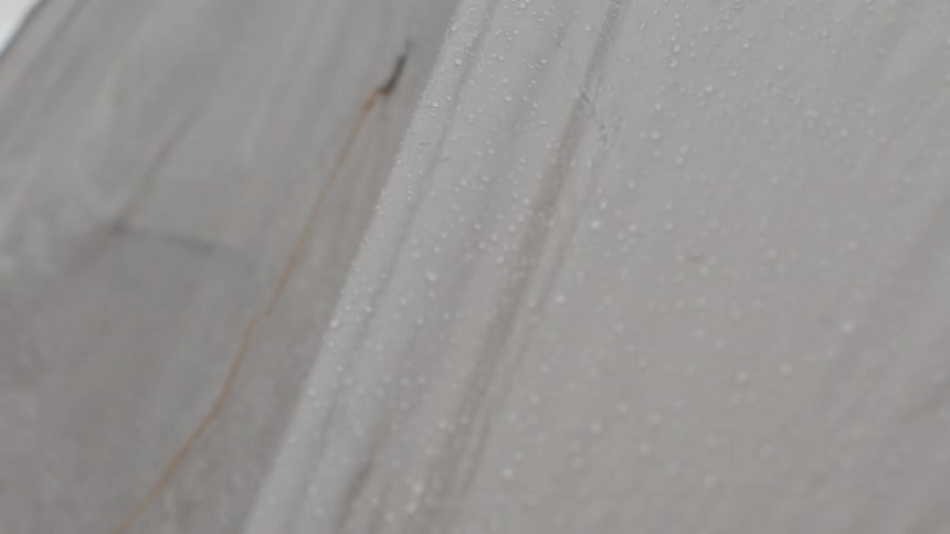Close up of a tent covered with water