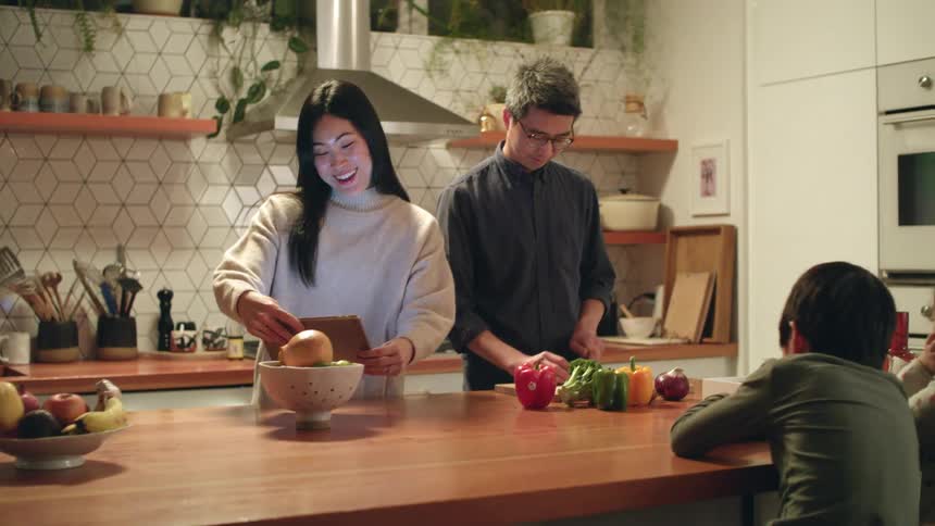 A family in a kitchen